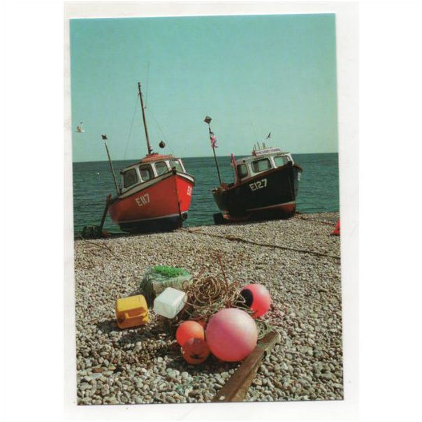 View of fishing boats buoys at Beer Devon shingle beach Redsail ...